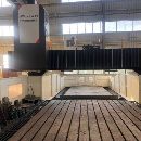 纽威PM3060HZ。工作台3X6米,门宽3.8米,门高1.6米。.